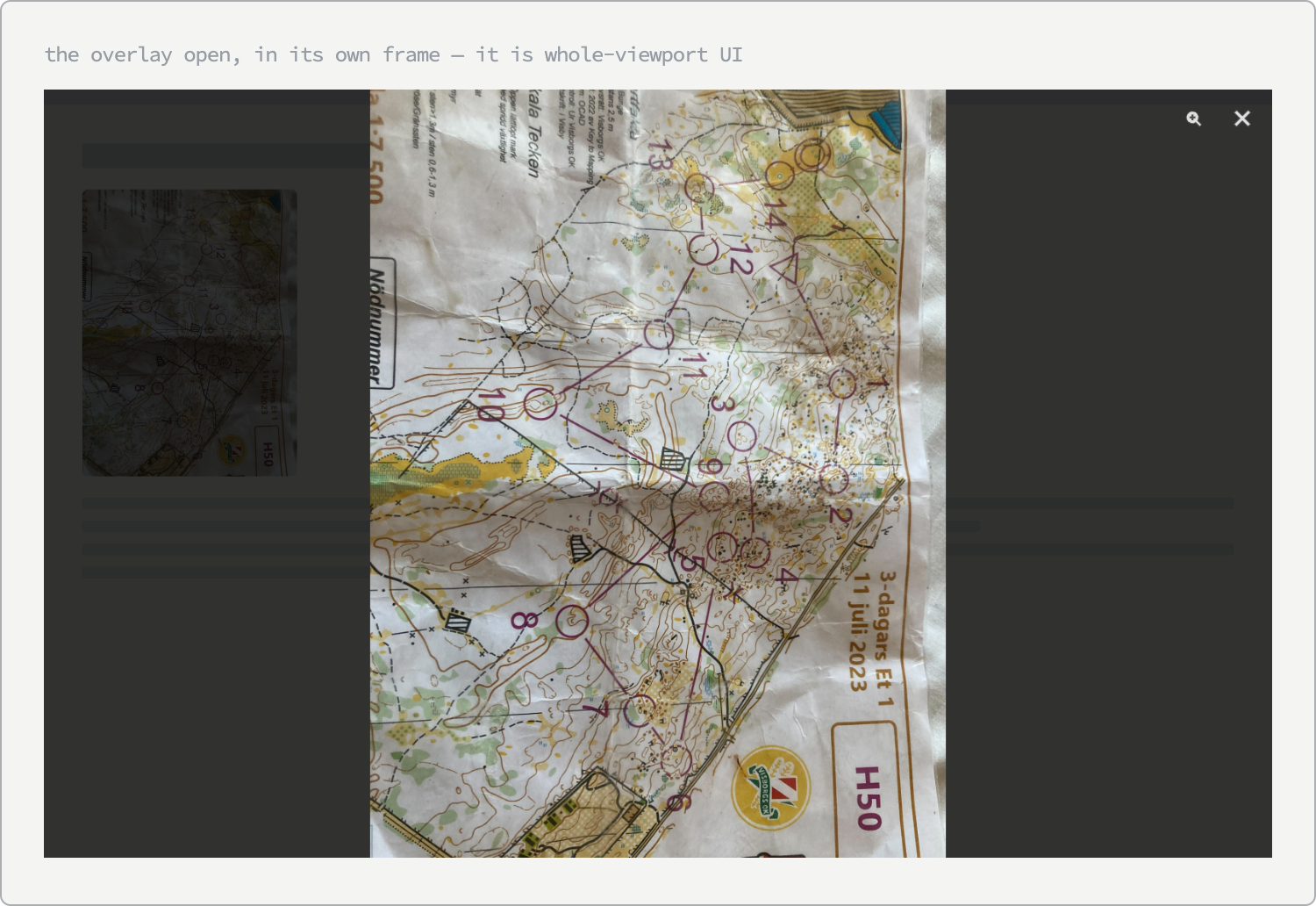 A browser-sized frame showing the lightbox open: the page dimmed behind a dark scrim, the full race map scan fitted to the height of the frame, and a zoom and a close button in the top right corner.