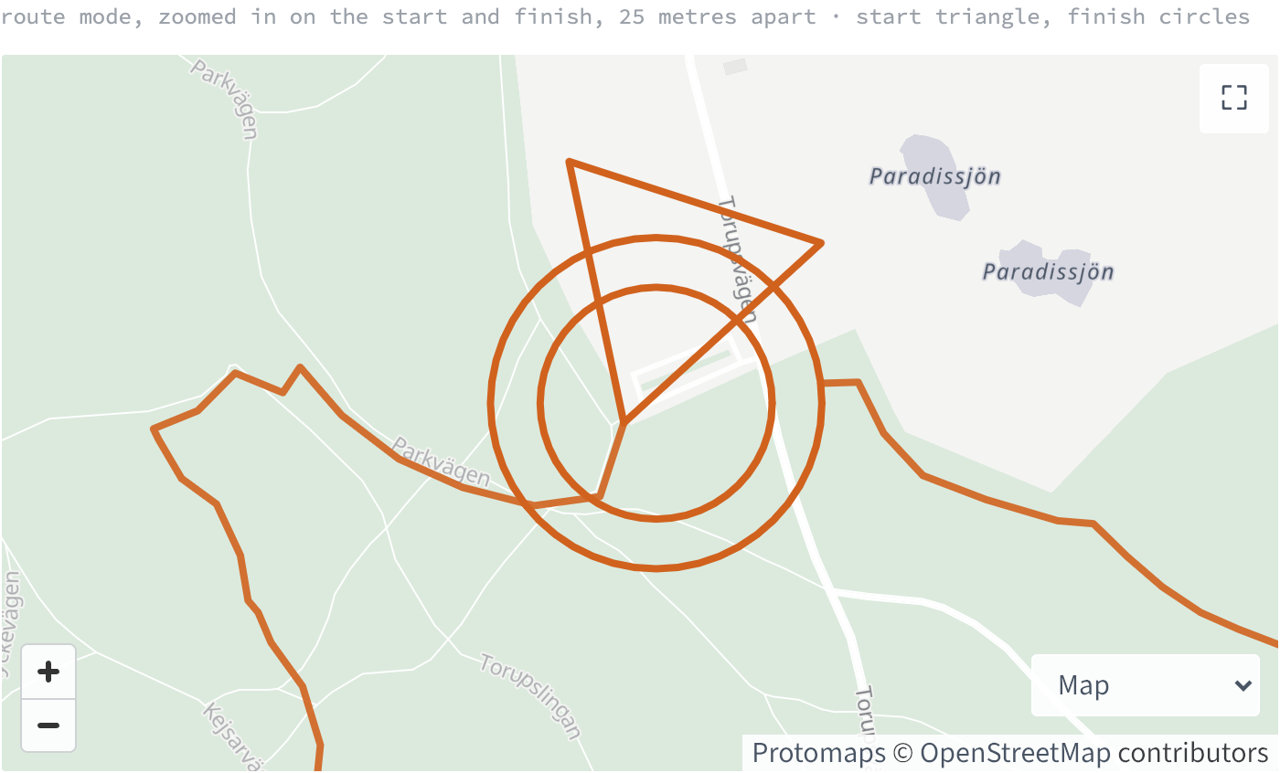 A pale green map of park paths with an orange route line running through it. Where the line begins, a hollow orange triangle drawn as thick as the line, its apex on the track and its body trailing back; a few metres away, two hollow concentric orange circles of the same weight marking the finish, where the line stops at the outer circle.